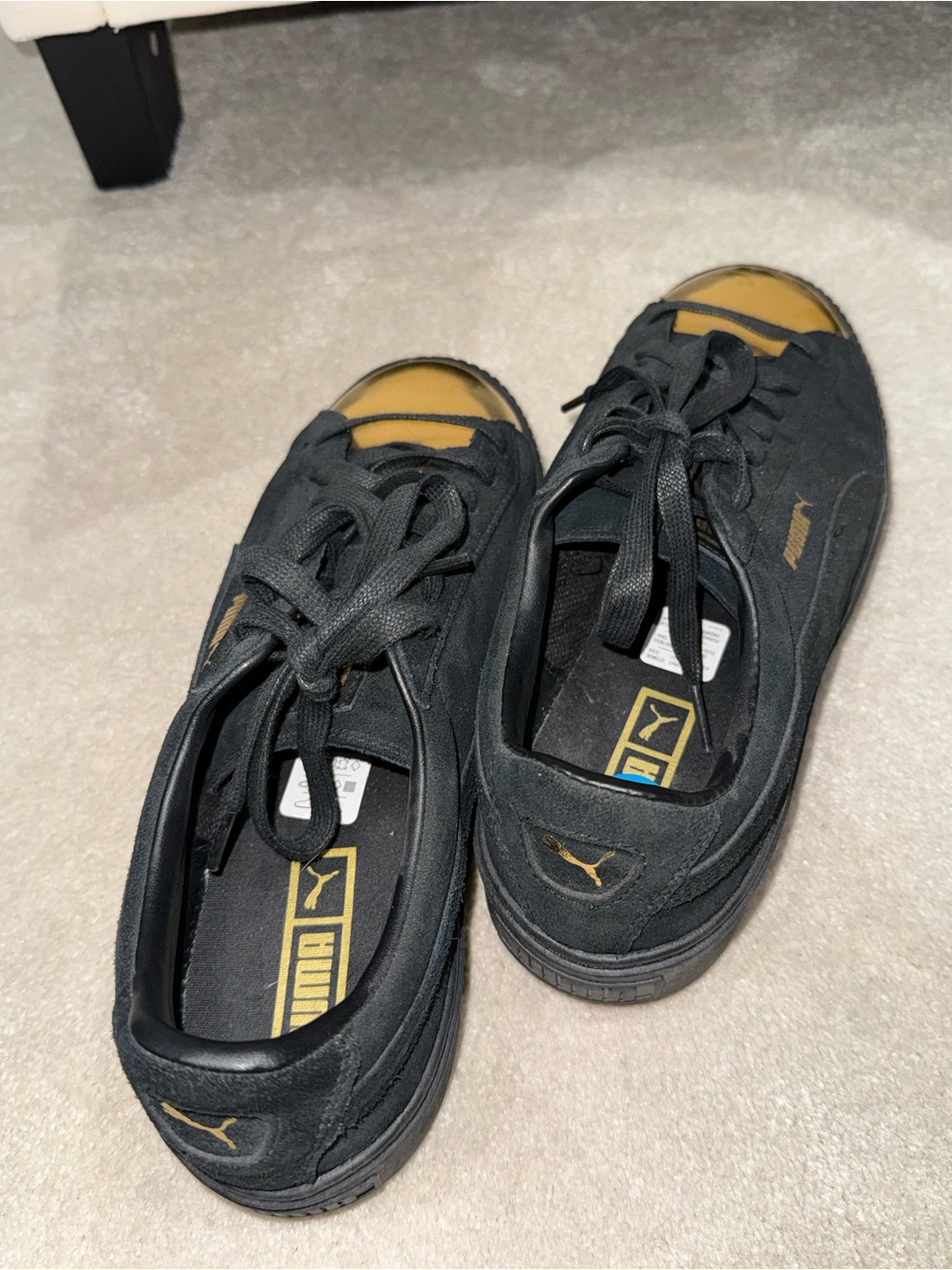 Puma Black Suede Sneakers with Gold Accents
